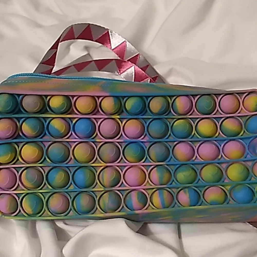 7.5 x 3.5 x 1 3/8 inches Rainbow Pop It Bag
